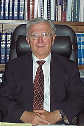 Man smiling at desk